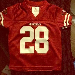 Toddle's 49er jersey.
